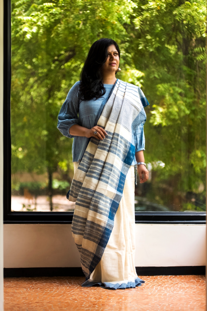 Falguni Patel, Appleblossom, top 100 Indian fashion blogs, fashion blogger in gujarat, ahmedabad blogger, saree blogger, saree pact, kutch kala cotton, Three threads, Ministry of utmost happiness, bibliophile, girl reading a book, susegad, slow life, old world charm , silver jewellery